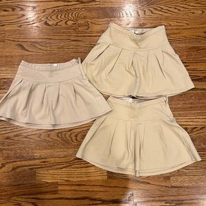 Pleated khaki uniform skirts